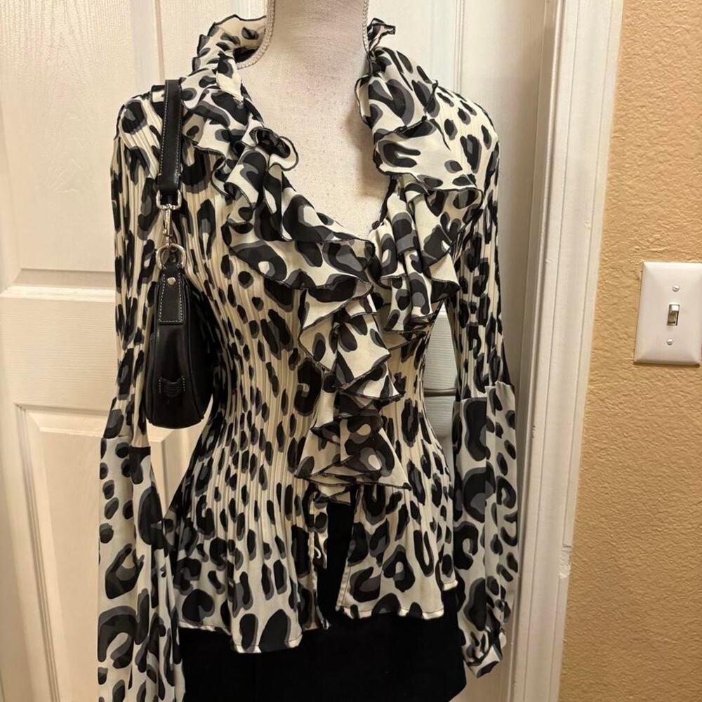 Sunny Leigh black grey and cream leopard print blouse with ruffles.